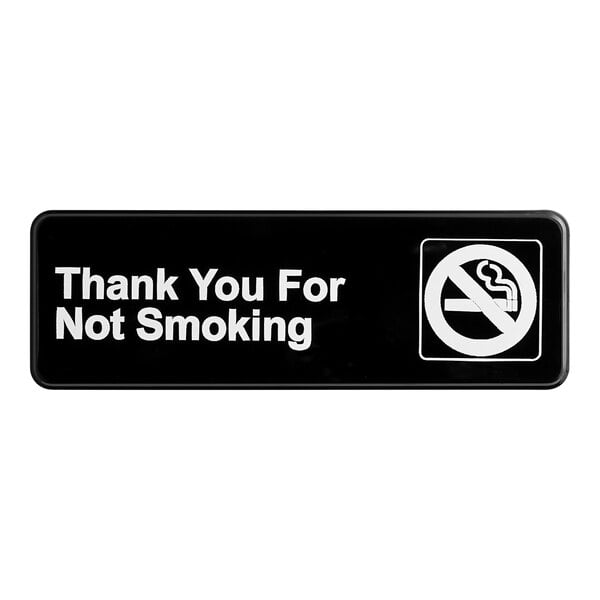 A black and white rectangular sign that says "Thank You For Not Smoking"