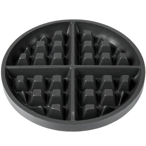 A round black pan with many square holes for Nemco Waffle Makers.