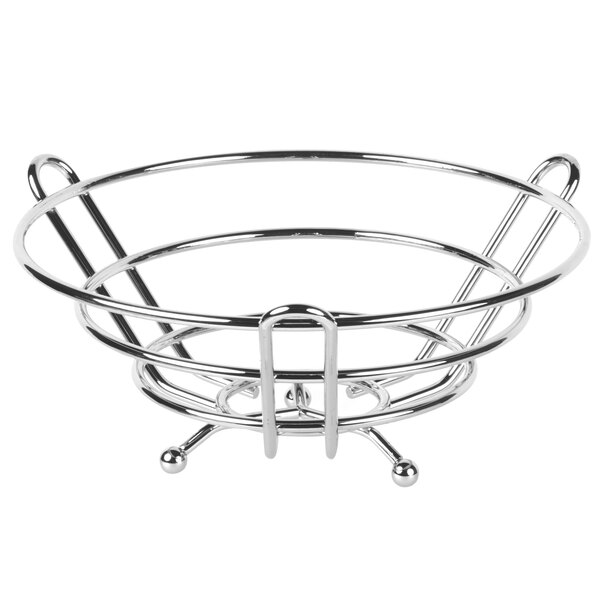 A Clipper Mill chrome plated iron round basket on a counter.