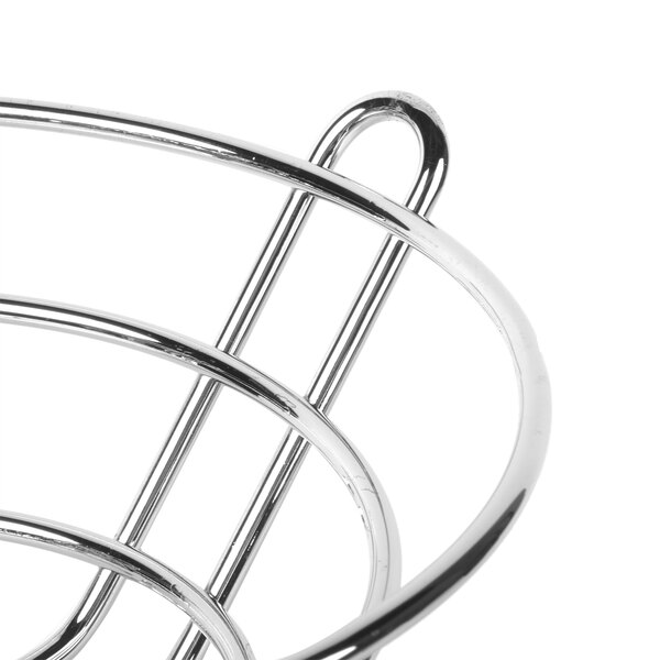 A Clipper Mill chrome plated iron round basket with a handle.