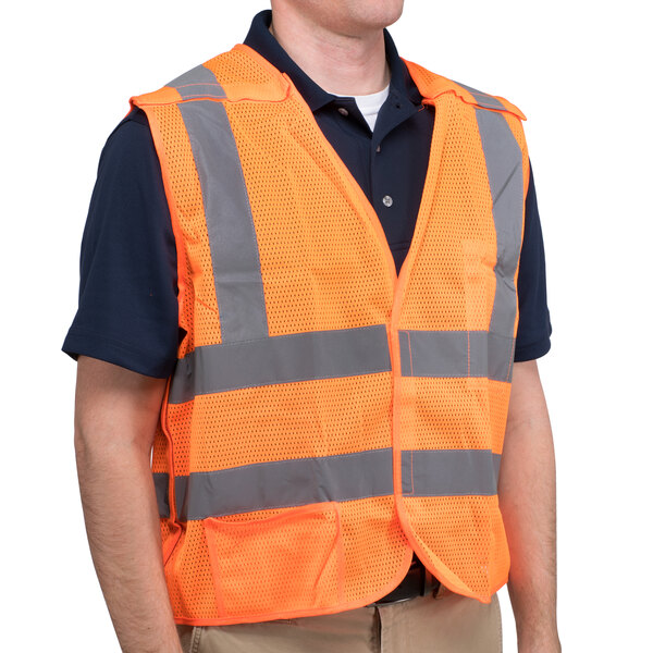 A Cordova orange safety vest with reflective stripes on a man.