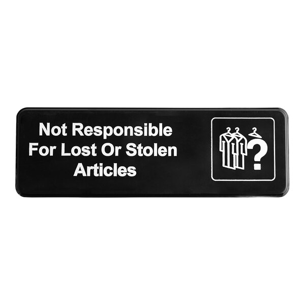 A black and white sign that says "Not Responsible For Lost Or Stolen Articles"