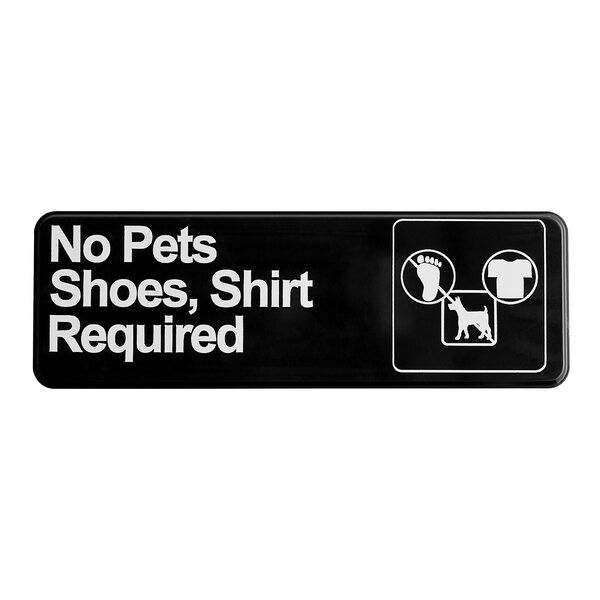 A black and white rectangular sign that says "No Pets, Shoes, Shirt Required"