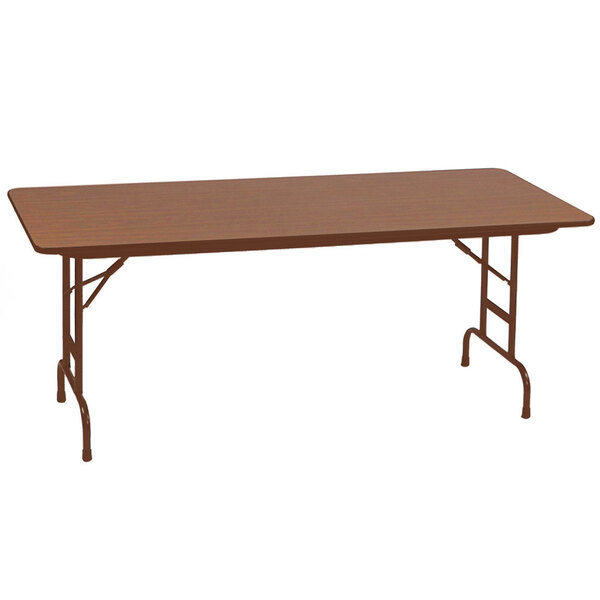 A brown rectangular Correll folding table with metal legs.