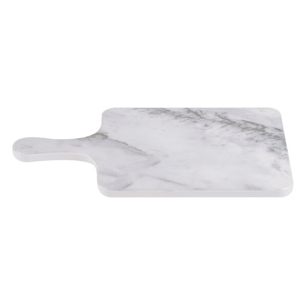 A white marble melamine serving board with handle.