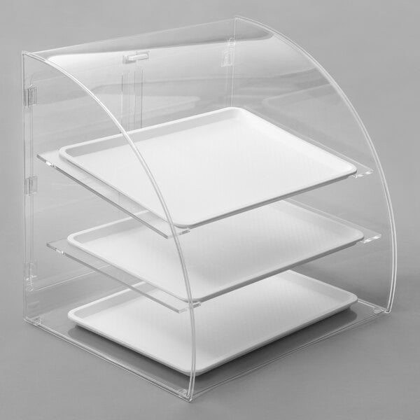 A clear acrylic display case with three white trays.