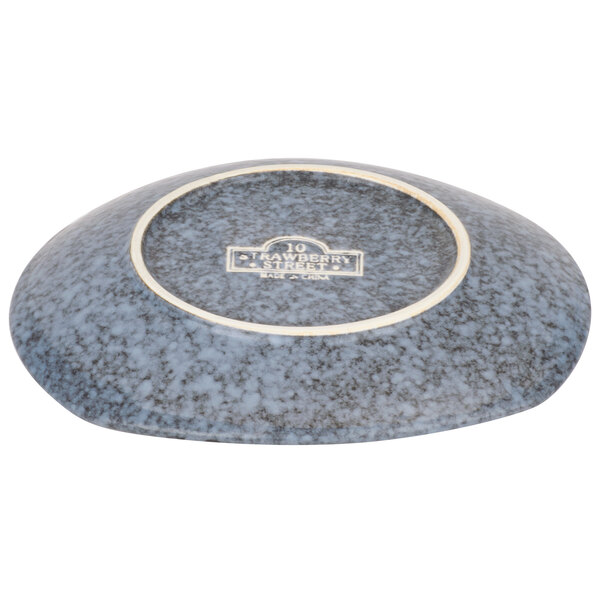 A close-up of a blue and white rectangular Biseki stoneware plate.