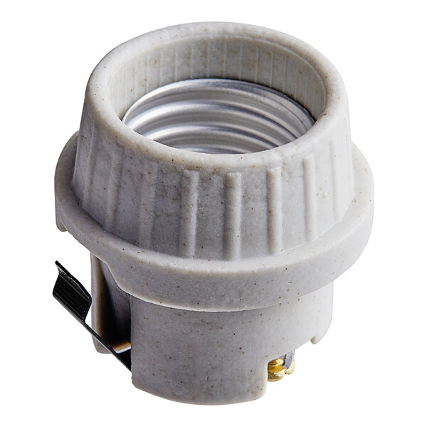 A white plastic lamp socket with a metal cap.