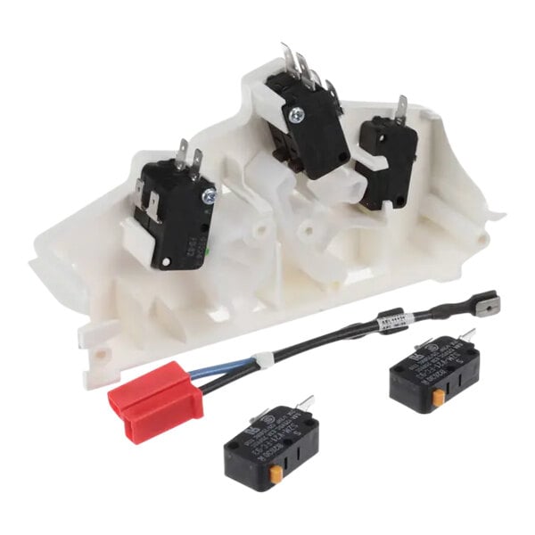 A white and black Amana Menumaster interlock switch kit with metal and plastic parts.