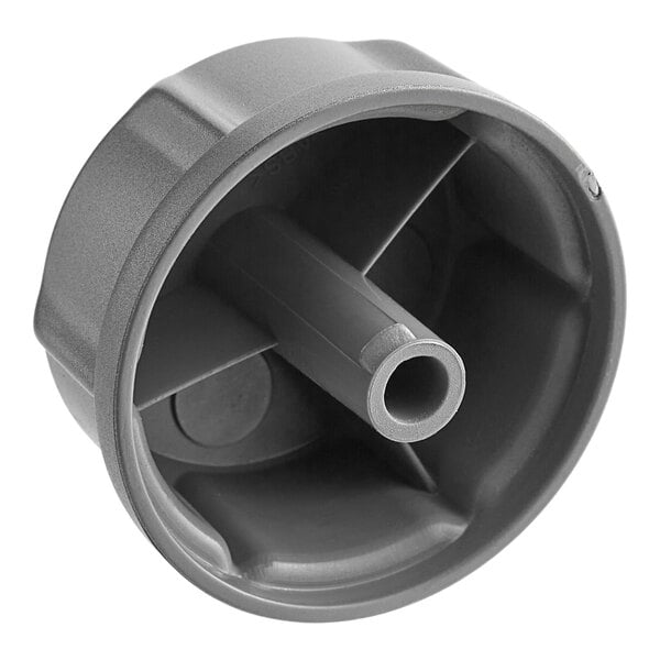 A grey circular Amana knob with a hole in it.