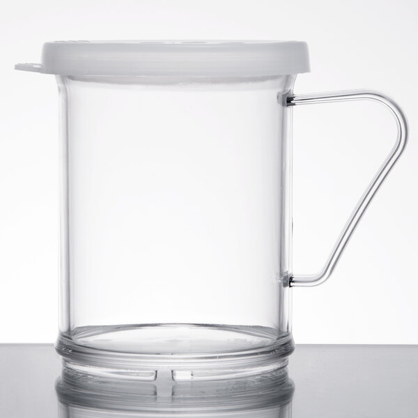 A clear plastic Cambro shaker with a white lid.