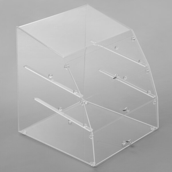 A clear plastic Vollrath bakery display case with front doors and three trays.