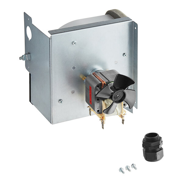 A small metal box with a black fan and a small metal device.