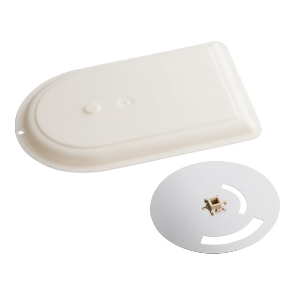 A white plastic rectangular Amana stirrer with a round disc.