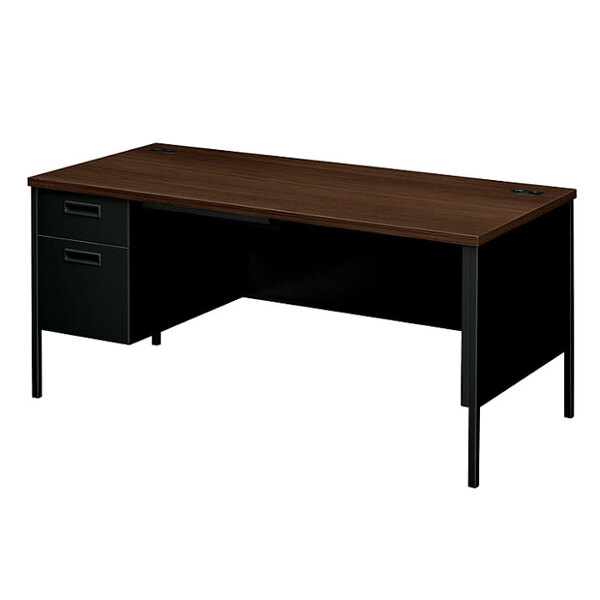 A mahogany desk with a metal base and left pedestal with two drawers.