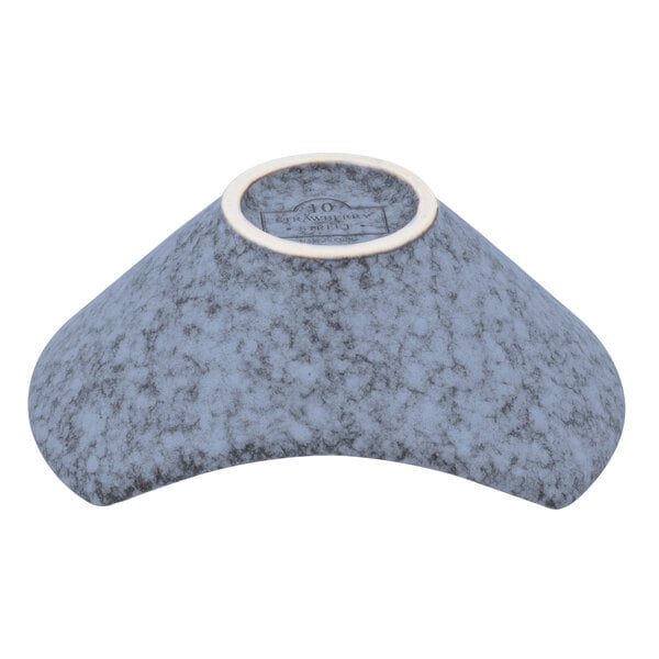 A blue ceramic bowl with a white rim.