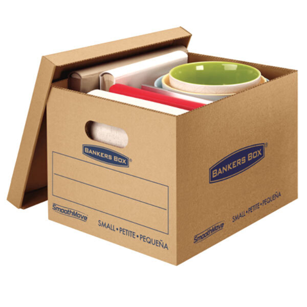 A Banker's Box small moving box with books, bowls, and mugs inside.