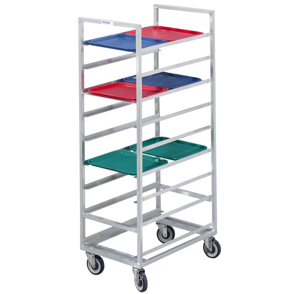 A Channel stainless steel tray rack with trays on it.