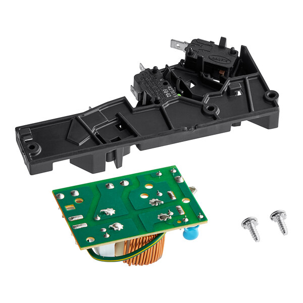 A black plastic Amana fuse holder with a green circuit board and silver screws.