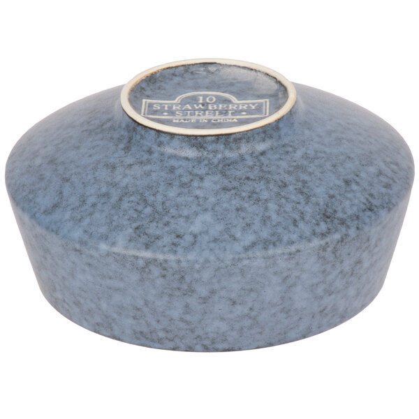 A blue Biseki stoneware bowl with a white label.