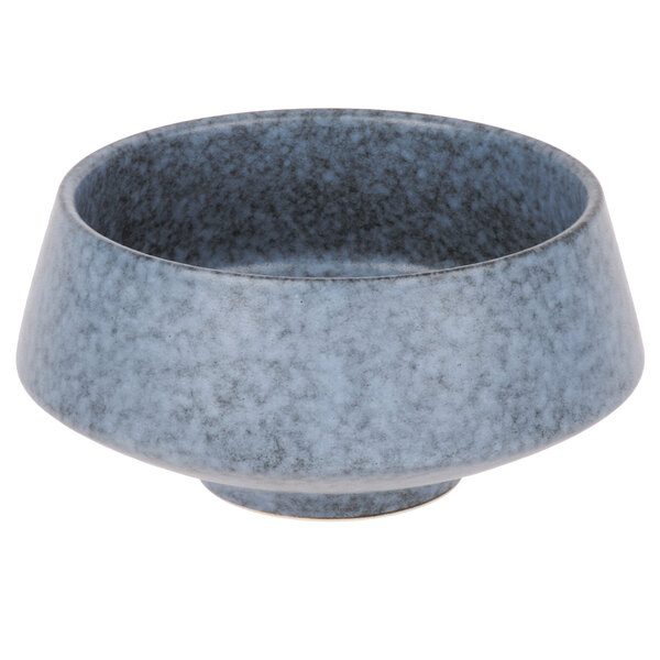 A close-up of a blue speckled 10 Strawberry Street Biseki stoneware bowl.