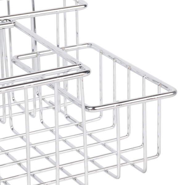 A Clipper Mill chrome metal 4-compartment condiment caddy.