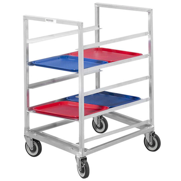 A Channel metal cafeteria tray rack loaded with three trays.