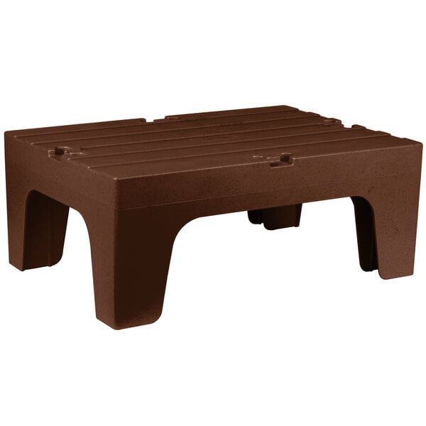 A brown plastic Cambro bow tie dunnage rack top.