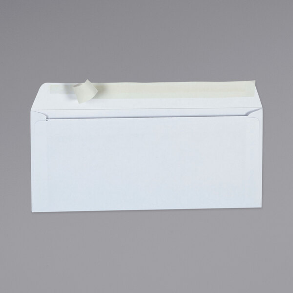 A close-up of a white Universal business envelope with a self-sealing adhesive strip on top.