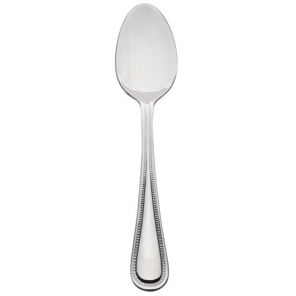 A 10 Strawberry Street Pearl stainless steel serving spoon with a beaded border.