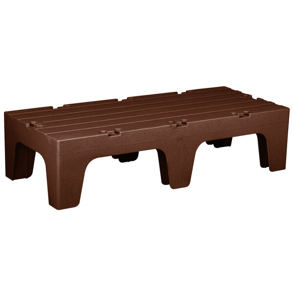 A brown plastic Cambro dunnage rack with three legs.