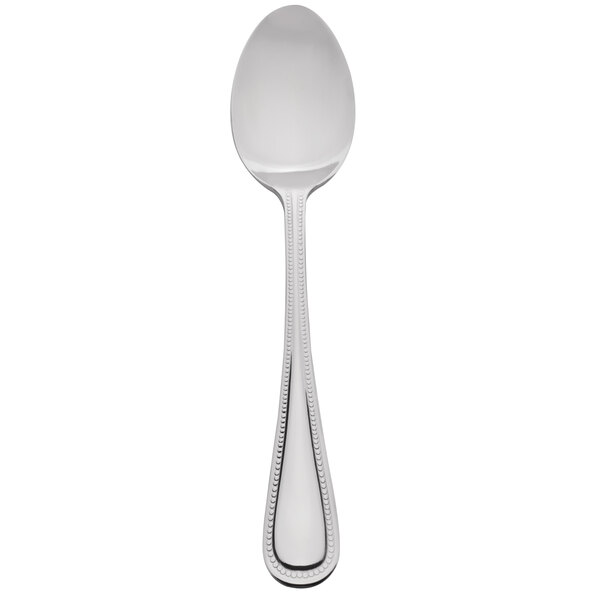 A silver 10 Strawberry Street Pearl stainless steel teaspoon with a white background.