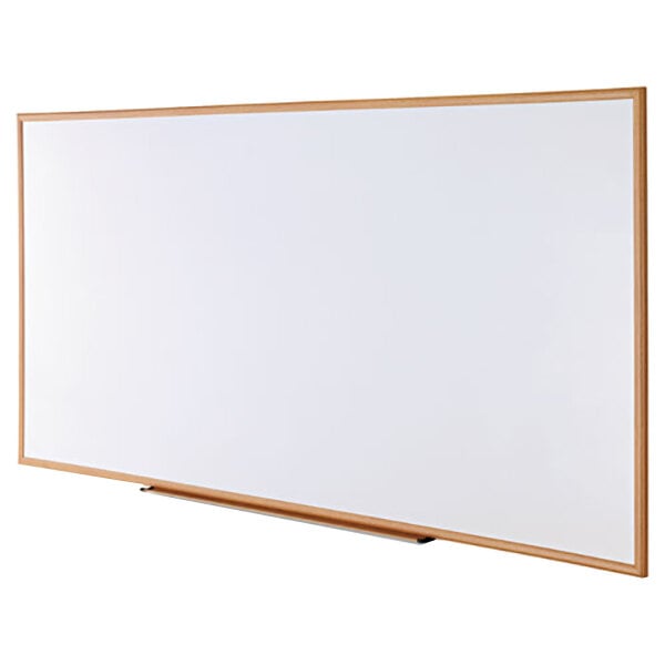 A Universal white board with a wooden frame.
