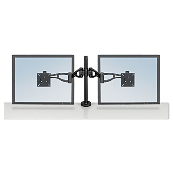A black Fellowes dual monitor arm holding two computer monitors on a white surface.