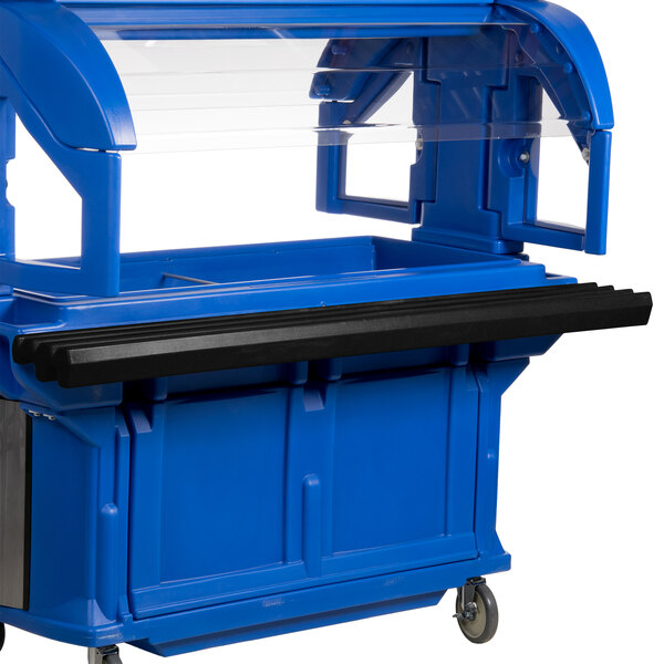 A blue food cart with a black Cambro tray rail on a counter in a salad bar.