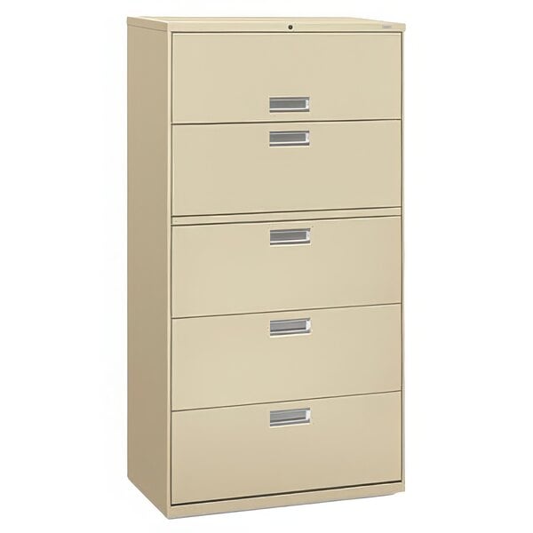 A tan metal filing cabinet with five drawers and silver handles.