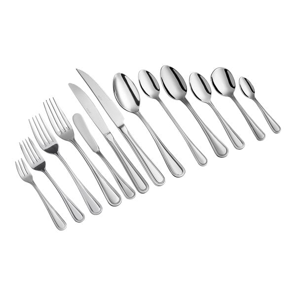 A close-up of Acopa Edgewood stainless steel bouillon spoons.