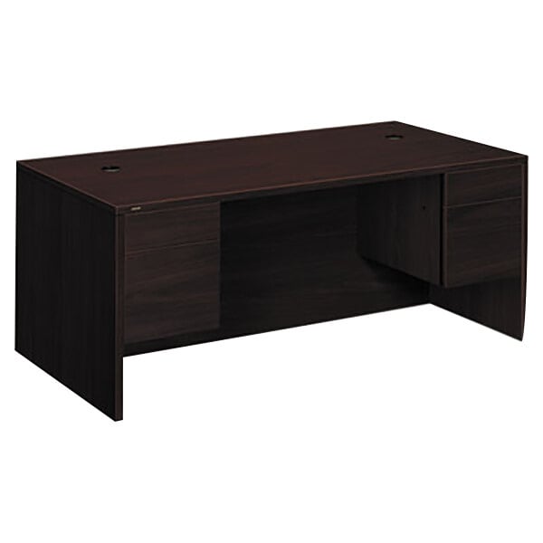 A dark brown HON 10500 Series double pedestal desk with two drawers.