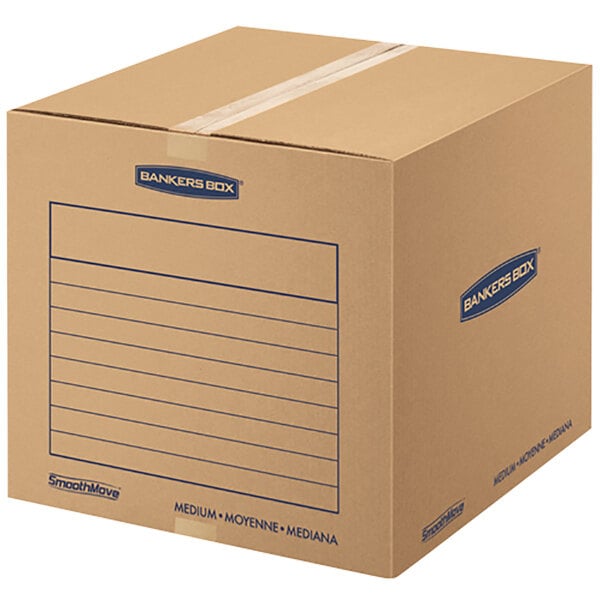 A brown Banker's Box cardboard moving box with blue writing.