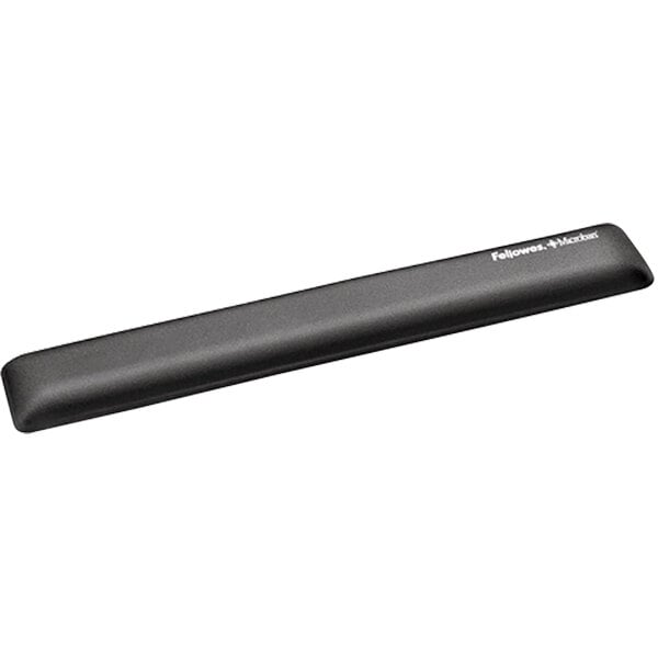 A black rectangular Fellowes wrist support with graphite text.