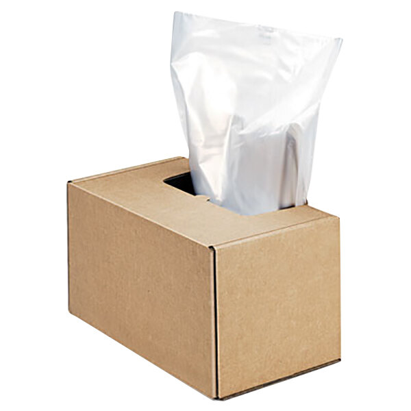 A brown box with a plastic bag inside containing Fellowes 50 gallon shredder bags.