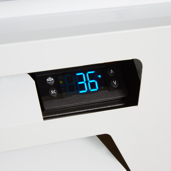 A Beverage-Air MarketMax refrigerated glass door merchandiser with a digital temperature display.