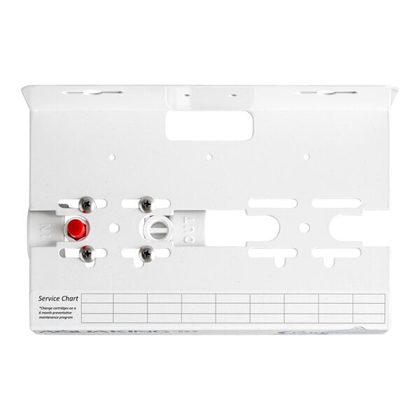 A white plastic board with a red button and screws.