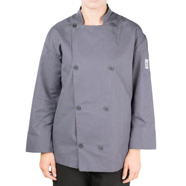 A person wearing a Chef Revival gray long sleeve chef jacket with mesh back.