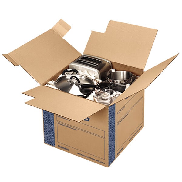 A Banker's Box SmoothMove medium moving box filled with kitchen utensils.