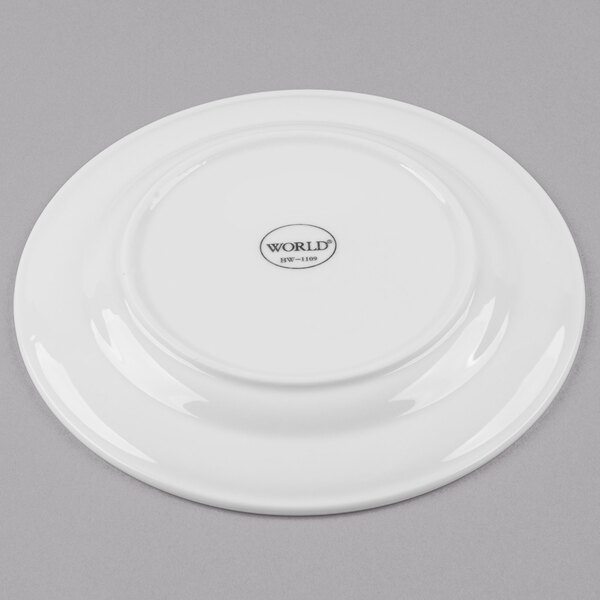 A Libbey bright white porcelain plate with a medium rim.