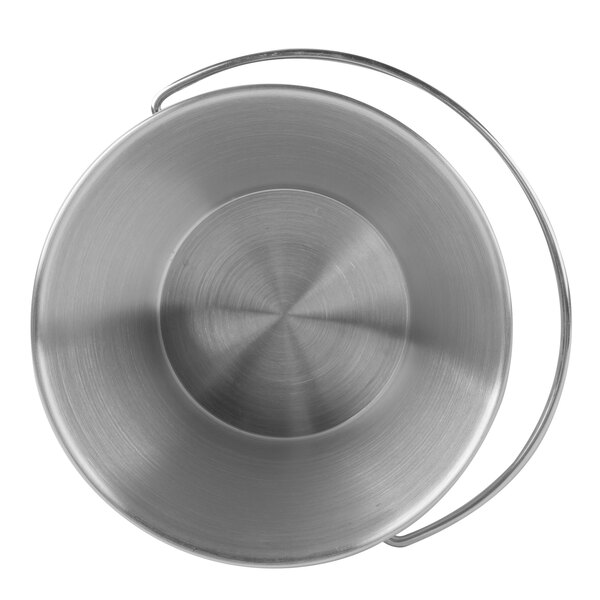 A stainless steel round metal bowl with a handle.