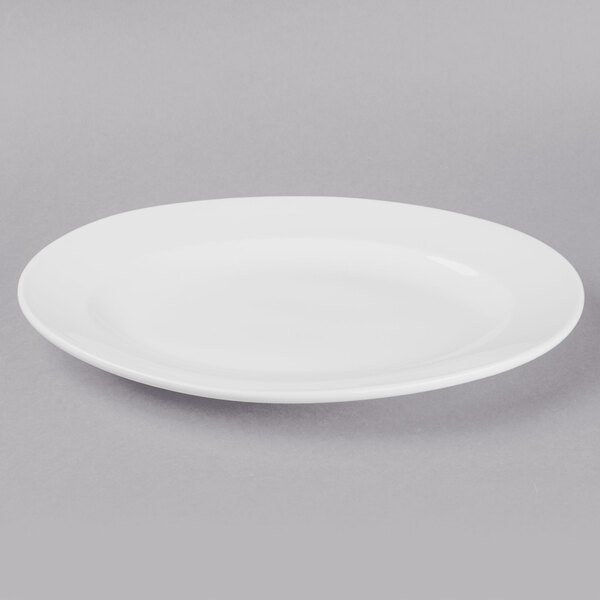 A white Libbey oval platter with a rim.