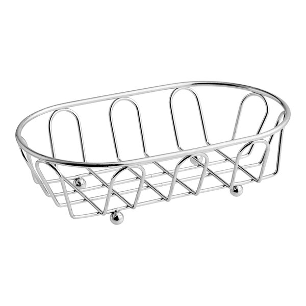 A Clipper Mill chrome metal wire basket with oval holes and handles.