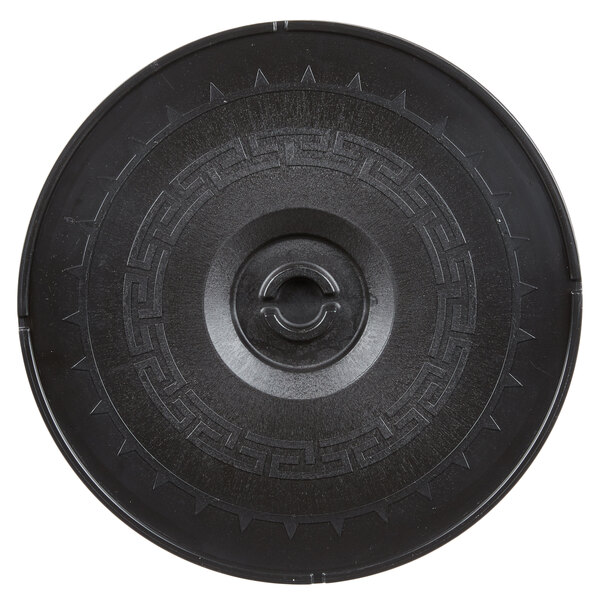 A black circular Carlisle tortilla server with a pattern on it.